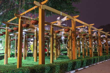 Composition with hanging flower pots  The evening lighting  Landscaping in Macau の写真素材