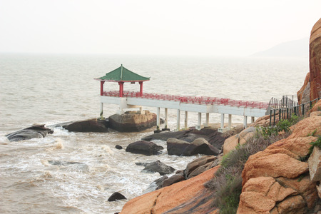 Chinese pergola on the sea coast in Macao on april 2014の写真素材