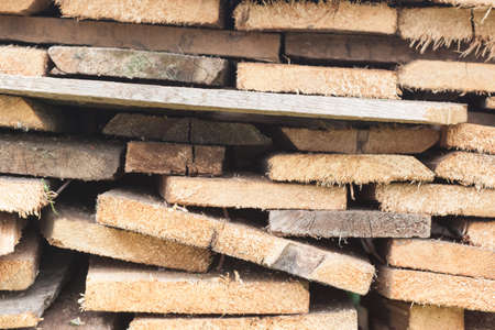 Boards stacked in a stack, backgroundの写真素材