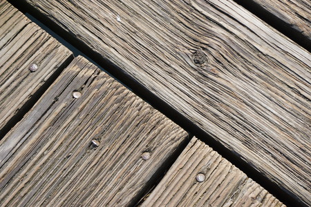 Intersection of weathered gray boards abstract horizontal background textureの写真素材