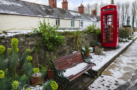 February 2, 2019 Tremeirchion, UK. A traditional British telephone box has been repurposed as a tourist and community information booth.のeditorial素材