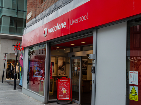 Liverpool, UK: Aug 3, 2018: A retail store branded as Vodafone in Liverpool. Vodafone is a multinational company which specialises in telecommunications. They are headquartered in London.のeditorial素材