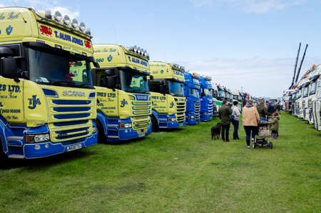 Llandudno, UK - May 5, 2019: Visitors to the Llandudno Transport Festival 2019 enjoy the displays and exhibits. The Llantransfest is held in conjunction with the annual Victorian Extravaganza.のeditorial素材