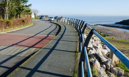 Greenfield, Flintshire, UK: Feb 6, 2020: During July to December, Greenfield Dock is where local fishermen land their catches of cockles. The North Wales Coastal Path passes the dock on Dee Estuary.のeditorial素材