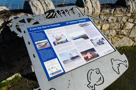 Greenfield, Flintshire, UK: Feb 6, 2020: During July to December, Greenfield Dock is where local fishermen land their catches of cockles. The North Wales Coastal Path passes the dock on Dee Estuary.のeditorial素材