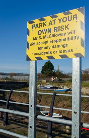 Greenfield, Flintshire, UK: Feb 6, 2020: During July to December, Greenfield Dock is where local fishermen land their catches of cockles. The North Wales Coastal Path passes the dock on Dee Estuary.のeditorial素材