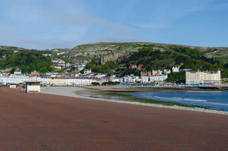 Llandudno, UK : May 6, 2019: A general scenic view of the promenade on North Shore, Llandudno. Very few people are out to enjoy the morning sunshine.のeditorial素材