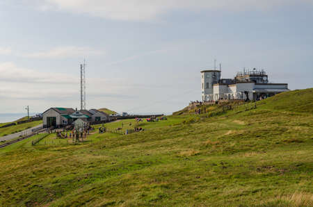 Llandudno, UK: Aug 27, 2019: A scenic view of the Summit Complex at the top of the Great Orme, with visitors enjoying the sunshine.のeditorial素材