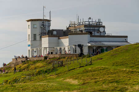 Llandudno, UK: Aug 27, 2019: A scenic view of the Summit Complex at the top of the Great Orme, with visitors enjoying the sunshine.のeditorial素材