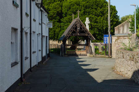 Abergele, UK: Aug 19, 2019: The Abergele Old Peoples Club is located on Church Street, along with the entrance to St. Michael's Church.のeditorial素材