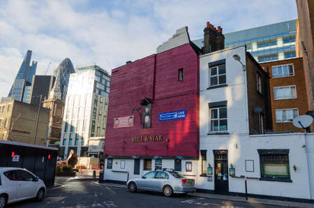 London, UK: Dec 2, 2017: A general street scene of the Still and Star public house, located on Little Somerset Street in the City of London.のeditorial素材