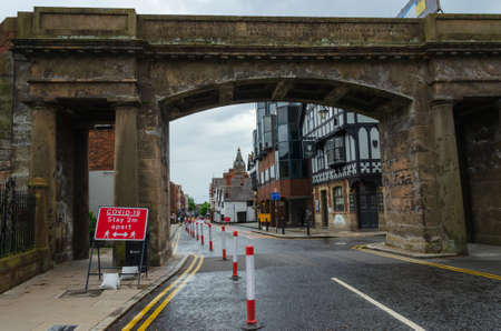 Chester, UK: Jun 14, 2020: A general street scene of Chester City centre showing some traffic & pedestrian restrictions which have been put in place to allow social distancing due to Covid-19 pandemicのeditorial素材