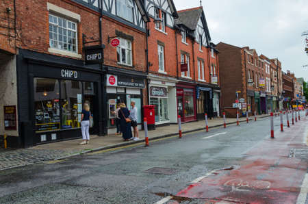 Chester, UK: Jun 14, 2020: A general street scene of Chester City centre showing some traffic & pedestrian restrictions which have been put in place to allow social distancing due to Covid-19 pandemicのeditorial素材