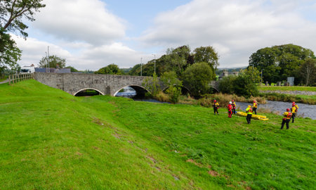 Bala; UK: Sep 20, 2020: A general scene in Bala showing the river bank whilst members of a Water...