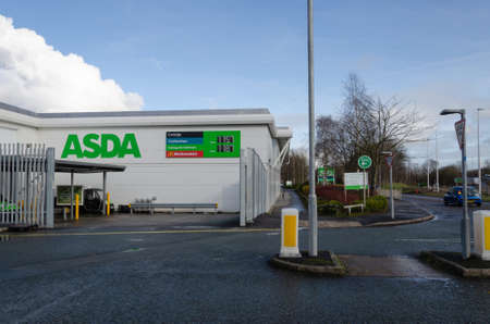 Queensferry; UK: Jan 29, 2021: Signage for an Asda supermarket and 24 hour fuel station.