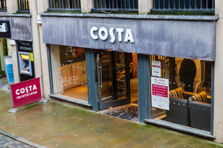 Chester; UK: Jan 29, 2021: Costa Coffee on Watergate Street is a national chain coffee shop which is open for take away during the pandemic lockdownのeditorial素材