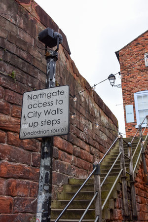 Chester, UK; Jul 3, 2022; A flight of steps leads to the Northgate access point of the Roman Chester City Wallsのeditorial素材