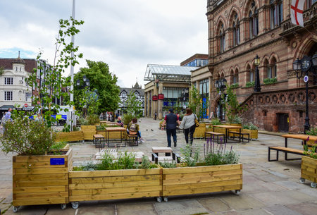Chester, UK; Jul 3, 2022; An alfresco seating area outside the Town Hall on Northgate Street.のeditorial素材