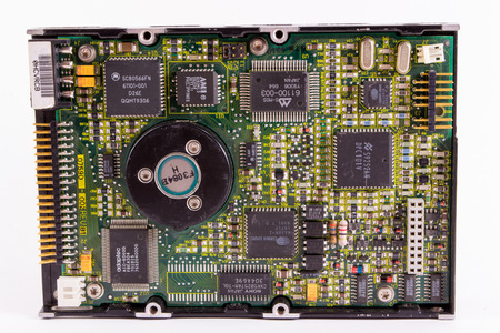Retro style hard drive close up with circuit boards