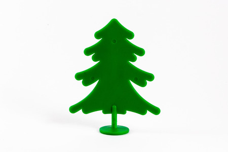 Green Plastic Pine Tree isolated on whiteの写真素材
