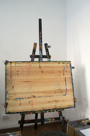 A used artists easel - wood and studio shotの写真素材