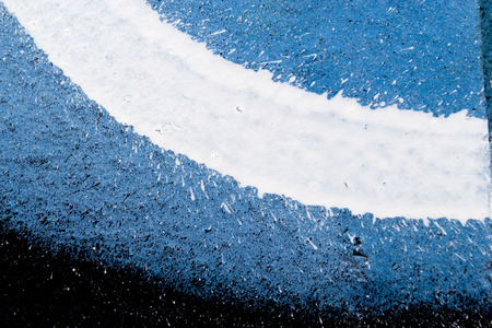 Close up detail of street graffiti on an urban brick wallの写真素材