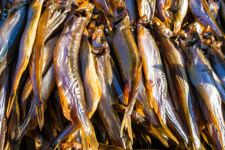 Local fish known as sparts at a traditional Fishmarket in Russiaの写真素材