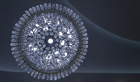 Abstract underneath shot of a large crystal chandelierの写真素材