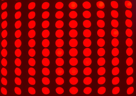 Rows of red led fairy lights in bokeh style closeupの写真素材