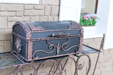 Single antique closed treasure chest with no keyholesの写真素材