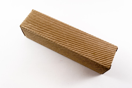 Single elongated corrugated style cardboard packaging texture in close-upの写真素材