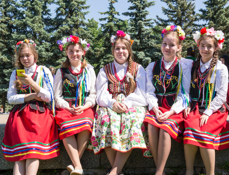 Five Russian girls in traditional Russian dress enjoy Russia Day holiday in Ufa Bashkortostan in July 2015のeditorial素材
