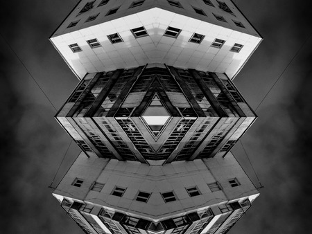 Symmetrical pattern of a block of modern Russian style houses in black and white with a dramatic and...