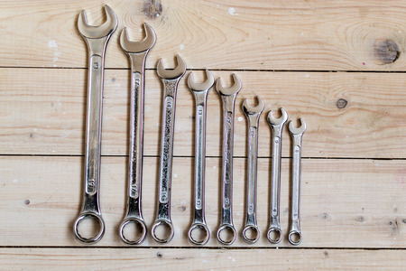 DIY Set of chrome metal home spanners. The wrenches are of various sizes with large copy space area...