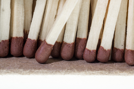 Macro close up image of common brown headed matches used for lighting gas, cigarettes, or candles.の写真素材