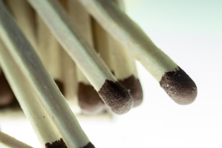 Macro close up image of common brown headed matches used for lighting gas, cigarettes, or candles.の写真素材