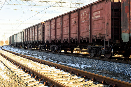 Train transport carraiges on a track moving logistics cargo along the traintrack