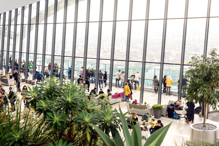 People inside viewing the free Sky Garden cafe on the 35th floor of 20 Fenchurch Street in London