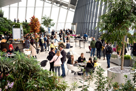 People inside viewing the free Sky Garden cafe on the 35th floor of 20 Fenchurch Street in Londonのeditorial素材