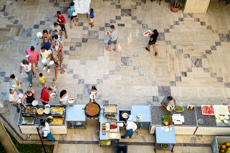 ANTALYA, TURKEY, 15TH JULY 2018 - Tourists queue up to take food from the A-la-Carte menu at the Q Aventura Hotel during the summer of 2018のeditorial素材