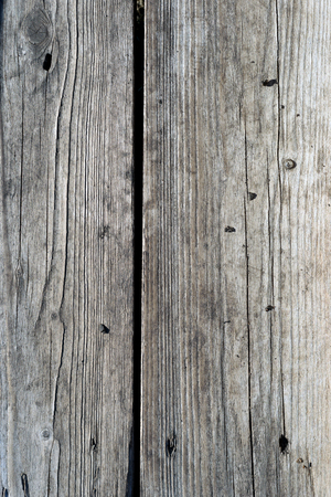 Worn and well-aged wooden plants joined together with copyspace area for carpentry and furniture based ideas and conceptsの写真素材