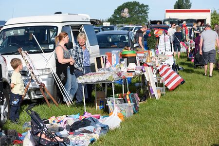 CHELMSFORD, ESSEX/ENGLAND - 1ST JUNE 2019 - People visiting a car boot sale in Boreham Essex where they can buy cheap and unusual items during the summer of 2019のeditorial素材