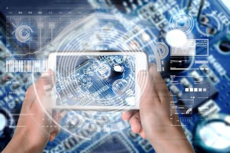 Augmented Reality device using smart technology, mixing virtual and augmentation reality through the application of artificial intelligence and computer AI tech assistance for electronic analysisの写真素材