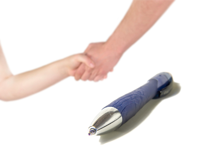 Pen on close up, with a background handshakeの写真素材