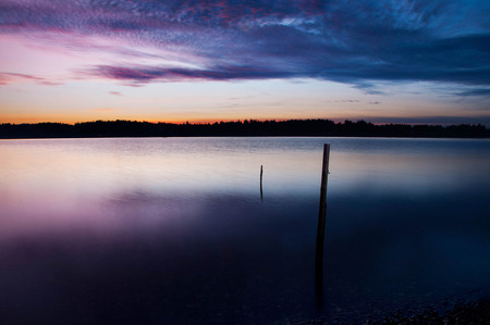 Beautiful Abstract After Glow With Reflection in the Waterの写真素材