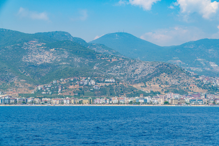 Views of the Mediterranean coast. Mountainous terrain. Coastal hotels, beaches, houses and gardens of Alanya. Turkeyの写真素材