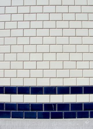 blue white tile pattern on a wall                                の写真素材