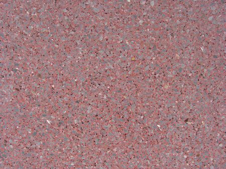 tiny gray red black flat pebbles                              の写真素材