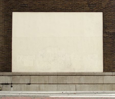 street view of large brick stone wall with empty white space                               の写真素材