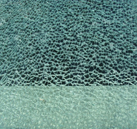 shattered glass from window in 2 shades of blue